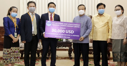VIETNAMESE ENTERPRISES JOIN HAND WITH LAO PDR TO FIGHT AGAINST COVID-19